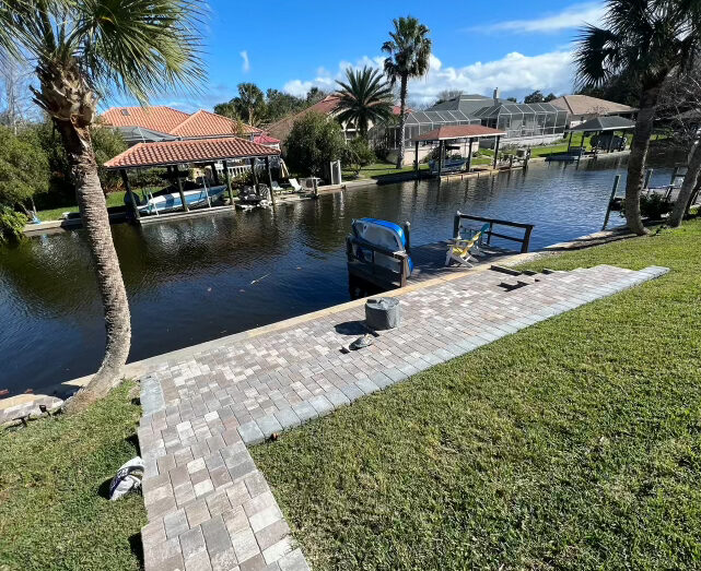 Picture of a finished paved boat dock and seawall